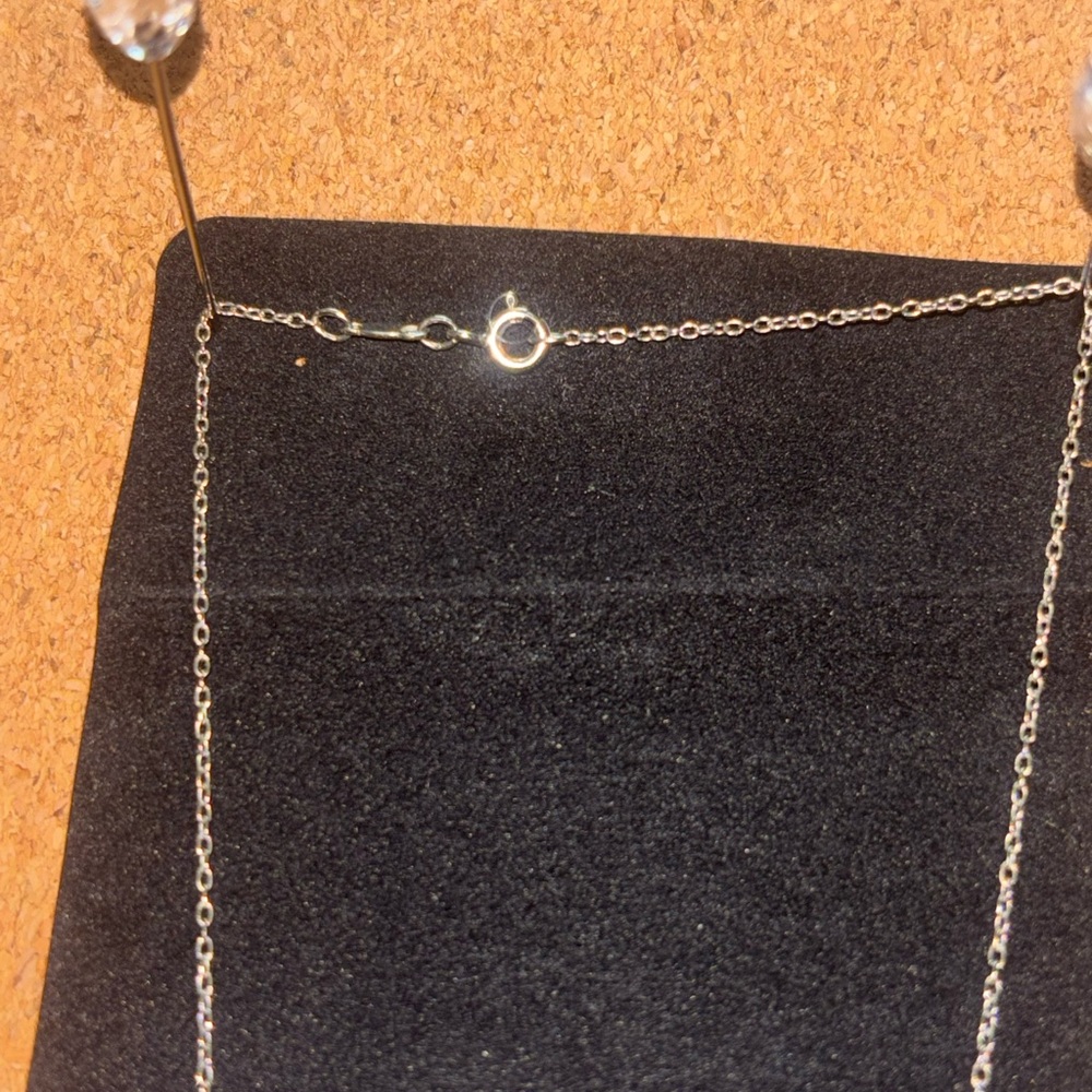 Elegant Sterling Silver Heart Pendant Necklace with Diamond Details - Picture 4 of 5